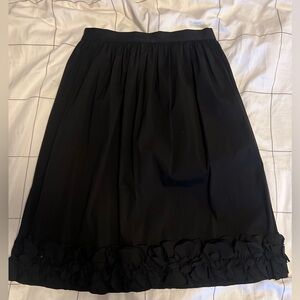 Prada skirt with zipper and tie closure in back and flower detail trim, black 40
